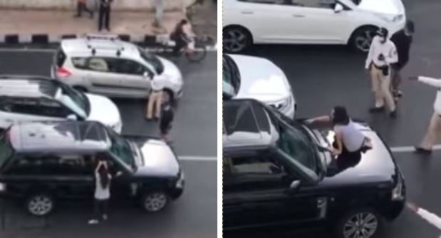 Scopre il marito in auto con un’altra, blocca il traffico e dà in escandescenze – Video