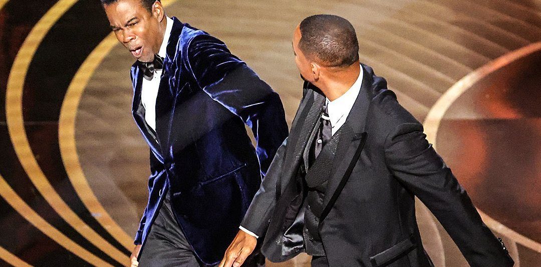 Will Smith picchia Chris Rock durante la notte degli Oscar: l’attore ha schivato l’arresto
