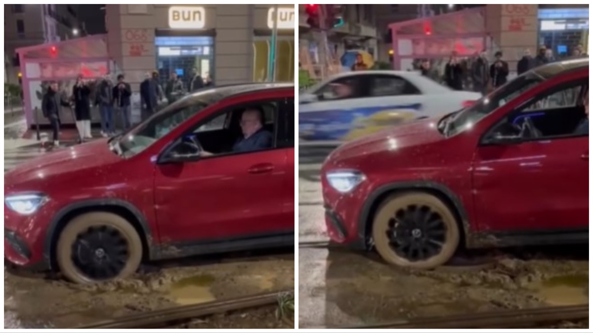 Massimo Boldi resta impantanato con l’auto sulle rotaie del tram: il video è virale