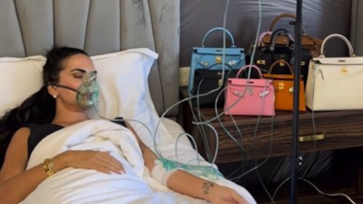 Influencer con la flebo attaccata a una borsa di lusso: è bufera social